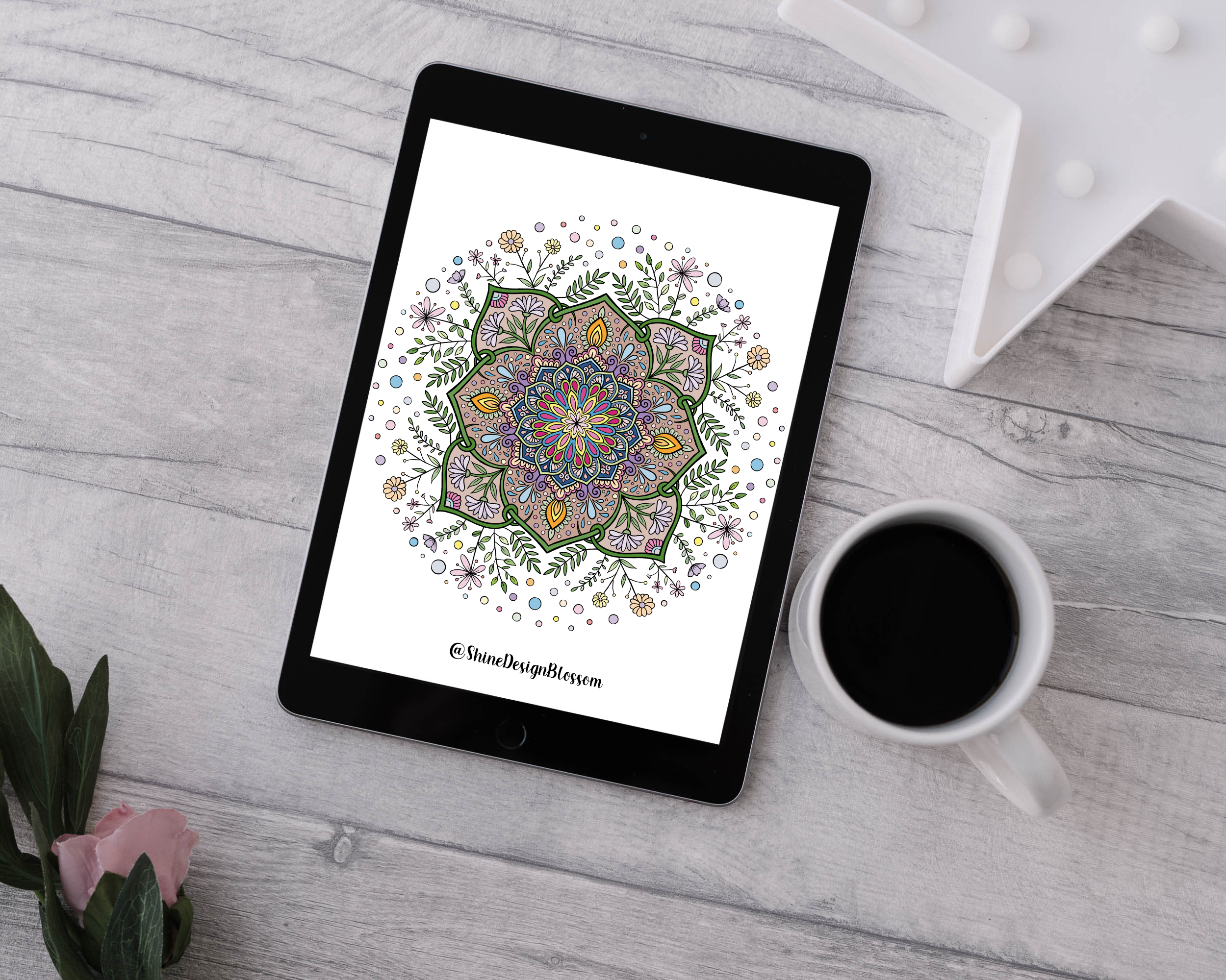 Shine Design Blossom mandala art displayed on iPad